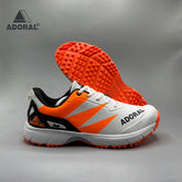 Adoral Jeet orange cricket shoes front view on white background