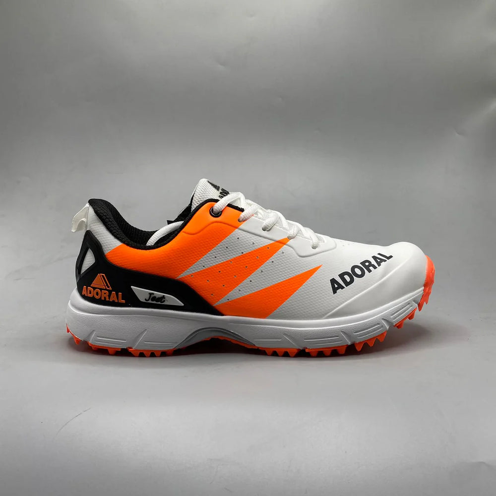 Bright orange breathable cricket shoes by Adoral