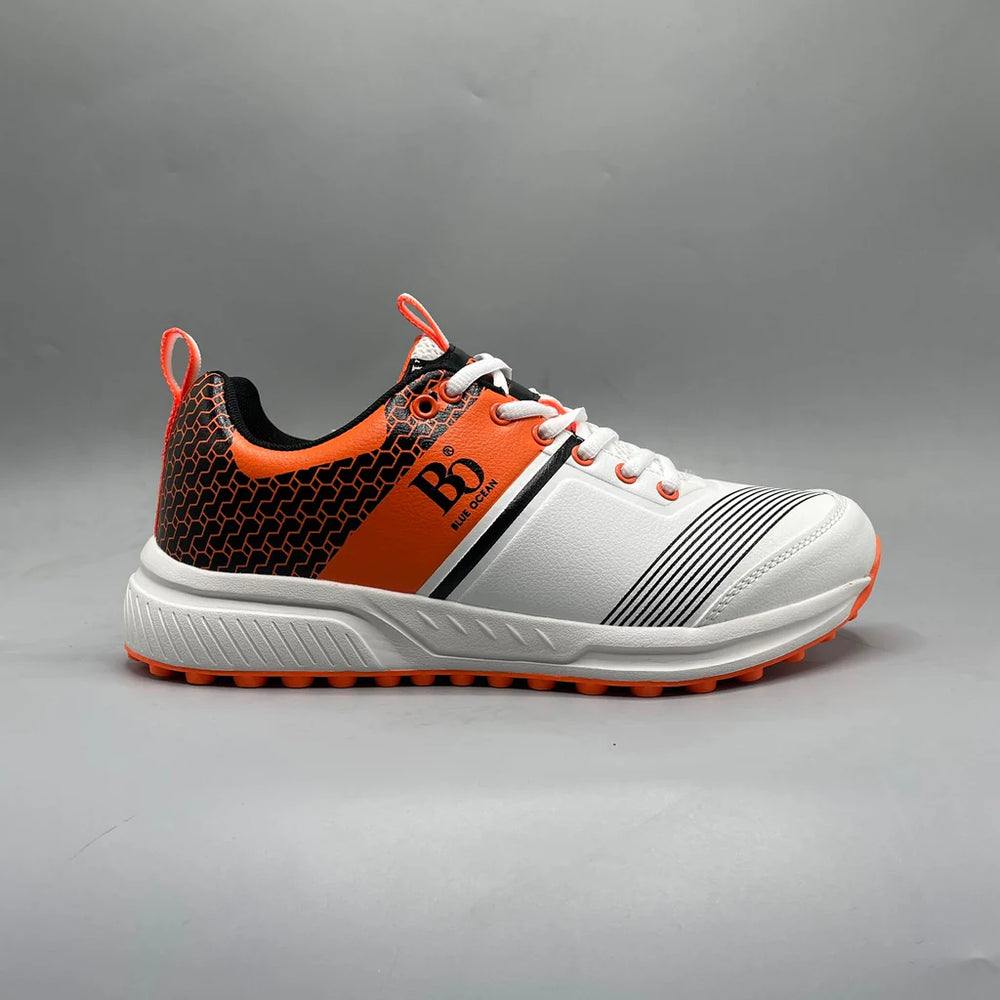 Cricket shoes with toe guard and breathable mesh upper