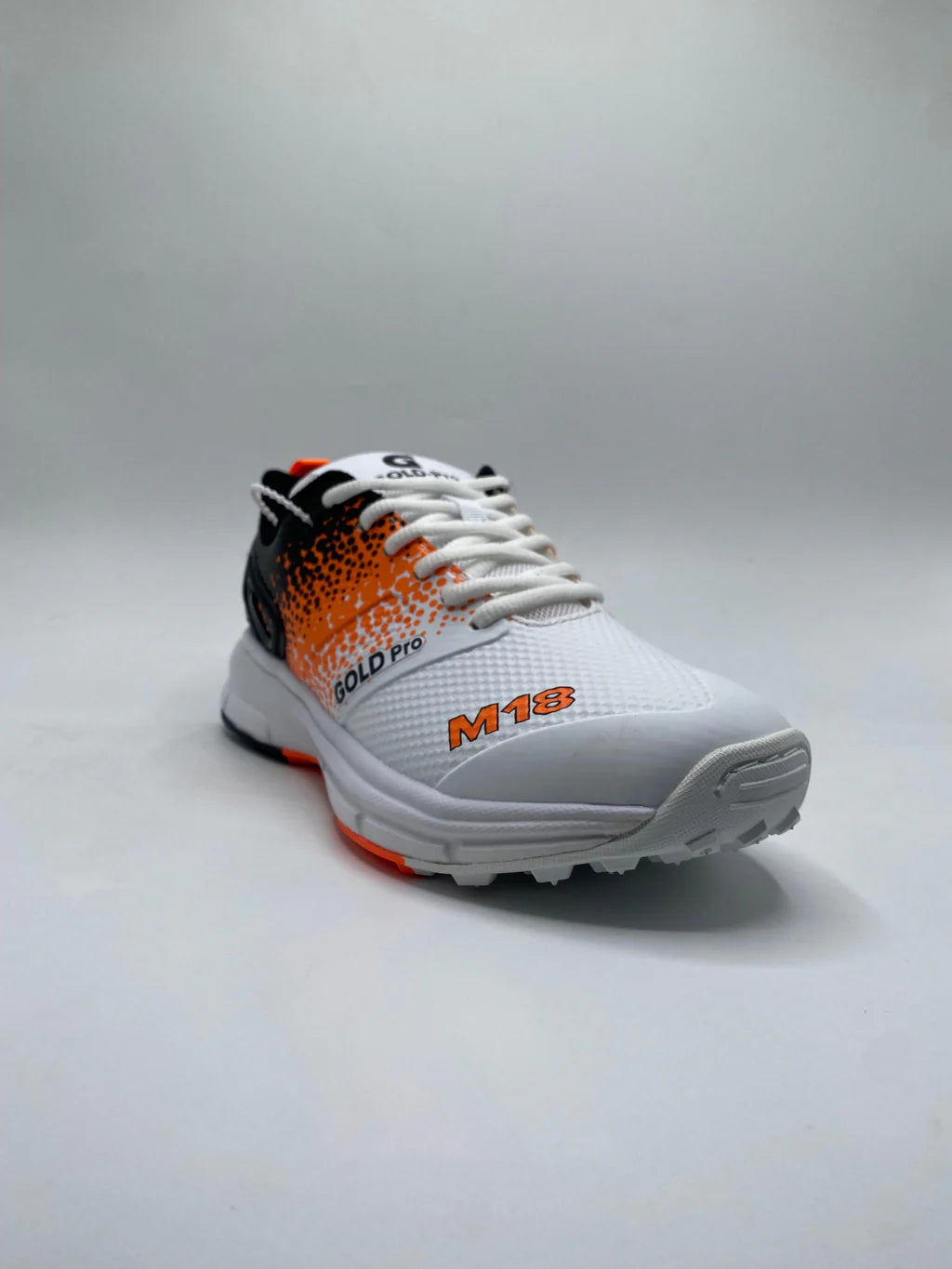 Gold Pro cricket gripper shoes white and gold front view
